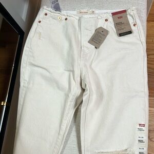 Levi’s off-white, distressed jeans, frayed waistband
